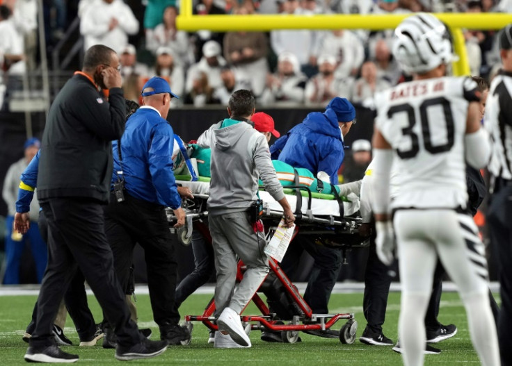 Miami quarterback Tua Tagovailoa, taken off the field in a stretcher with a concussion at Cincinnati, was ruled out for the Dolphins' next game against the New York Jets by coach Mike McDaniel