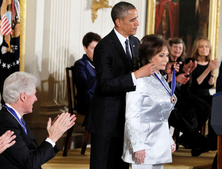 U.S. President Barack Obama presents the Presidential Medal of Freedom to singer Loretta Lynn at a ceremony in the East Room of the White House in Washington