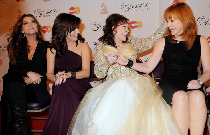 Country singers Wilson, McBride, Lynn and McEntire share a moment on the red carpet in Nashville