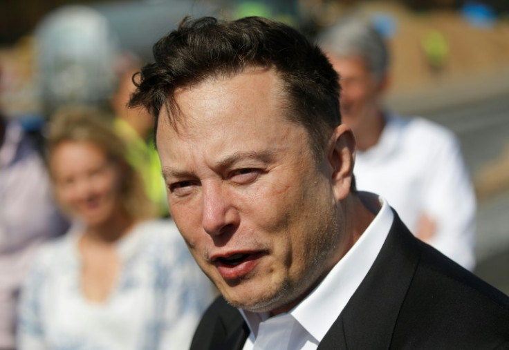 Elon Musk is reported to have told Twitter he will go through with buying the tech firm, just two days before he was to be deposed by Twitter attorneys for a trial set to start on October 17.