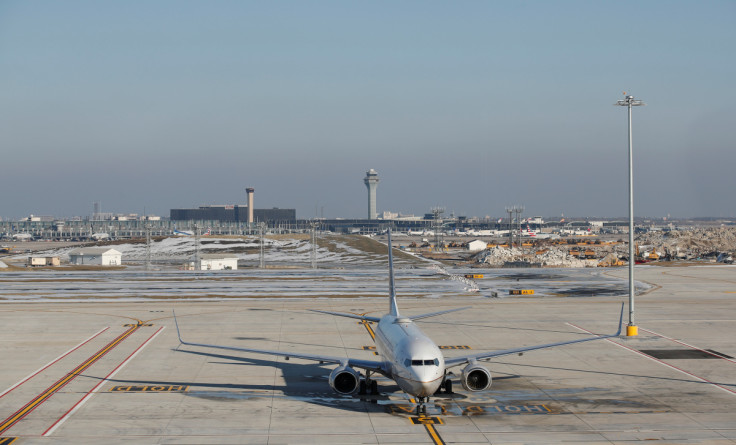 An United Airlines jet is seen on the tarmac prior to takeoff after deicing at the new Central Deicing Facility (CDF) at O'Hare International Airport in Chicago