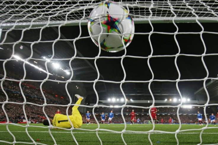 Mohamed Salah fires past Rangers' goalkeeper Allan McGregor for Liverpool's second goal on Tuesday
