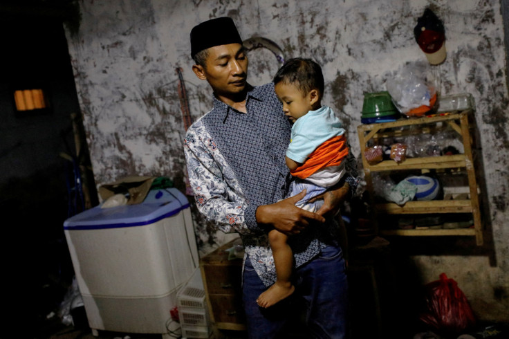 A husband who lost his wife and two adopted children in a recent soccer riot and stampede in Malang