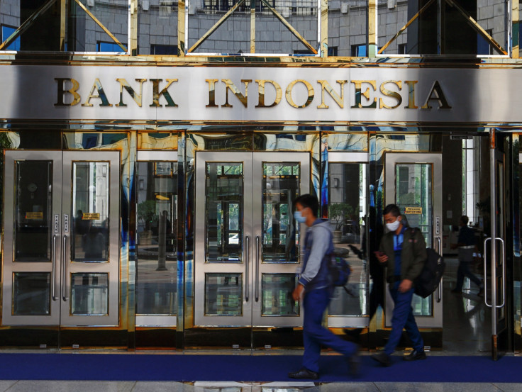 Workers leave Bank Indonesia headquarters