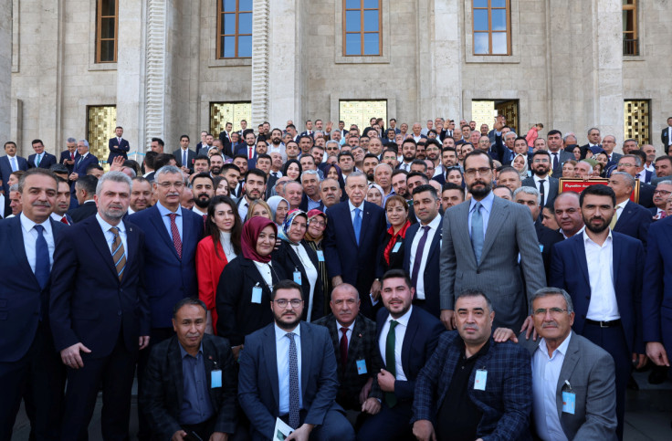 Turkish President Erdogan poses with the members of his ruling AKP in Ankara