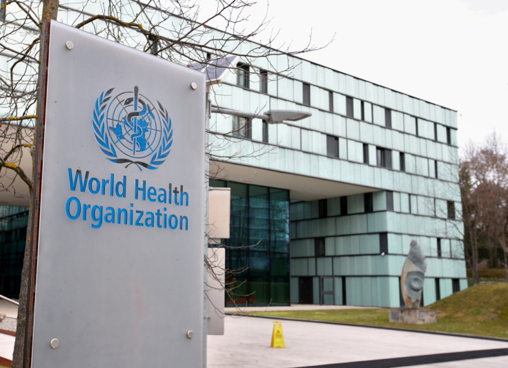 A logo is pictured outside a building of the WHO in Geneva