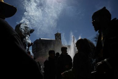 People smoke marijuana in Washington Square Park on the annual but informal cannabis holiday, 4/20 in New York