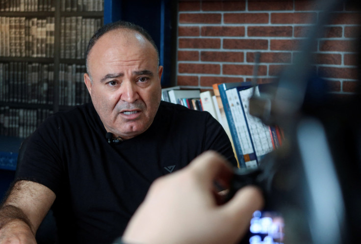 Tunisian prominent journalist Mohamed Boughalleb speaks during the filming of his show in Tunis