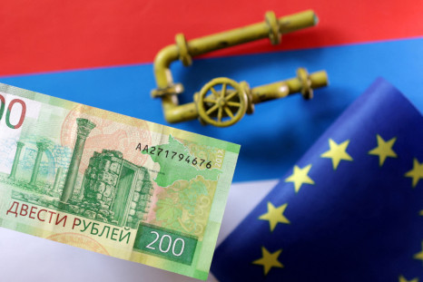 Illustration shows model of natural gas pipeline, Rouble banknote, Russian flag and torn EU flag