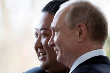 Russian President Vladimir Putin and North Korea's leader Kim Jong Un pose for a photo during their meeting in Vladivostok