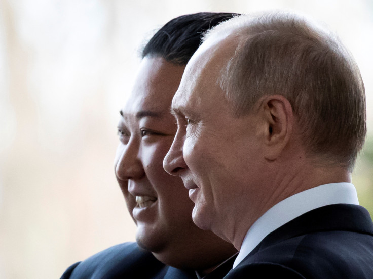 Russian President Vladimir Putin and North Korea's leader Kim Jong Un pose for a photo during their meeting in Vladivostok