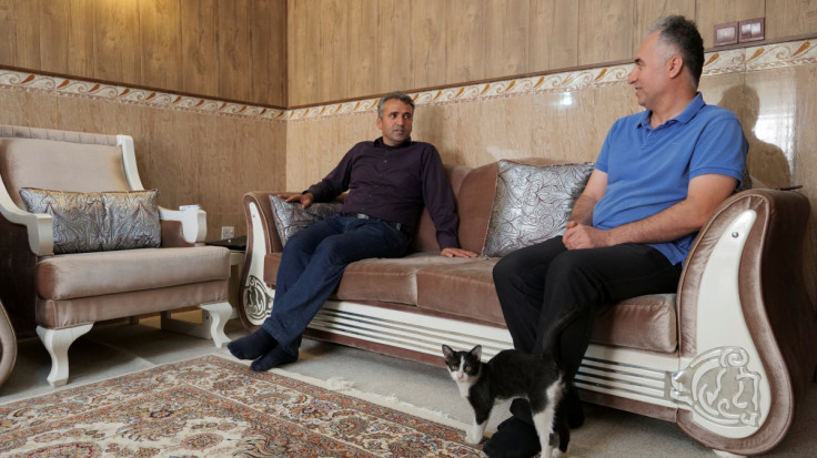Khaled Abdullazade and his friend Farhad Suleimanpoor speak, where they live since they left Iran, in Erbil