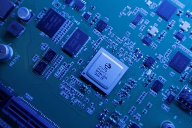 FILE PHOTO - Hi1710 BMC management chip is seen on a Kunpeng 920 chipset designed by Huawei's Hisilicon subsidiary is on display at Huawei's headquarters in Shenzhen