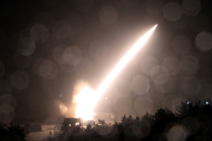 This handout photo taken on October 5, 2022 and released by South Korea's Defence Ministry in Seoul shows the Army Tactical Missile System (ATACMS) firing a missile from an undisclosed location on South Korea's east coast during a South Korea-US joint liv