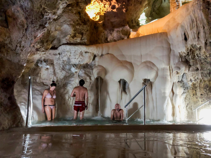 Bathers relax at the Cave Bath in Miskolctapolca