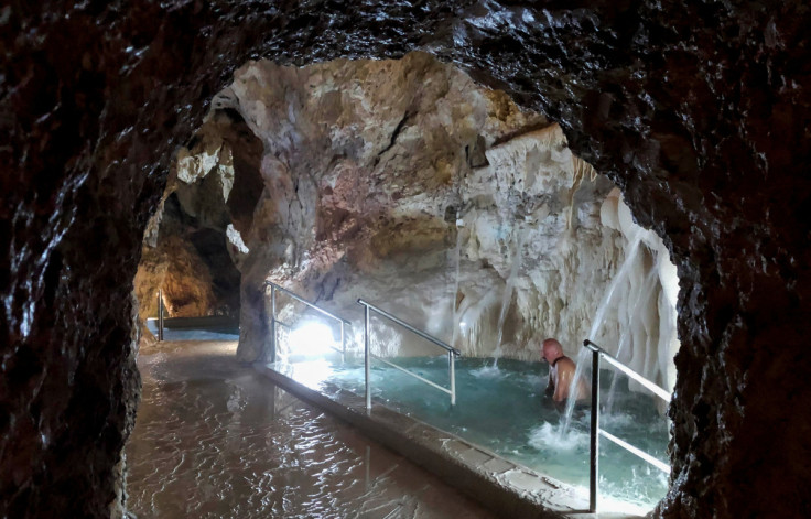 A bather relaxes at the Cave Bath in Miskolctapolca
