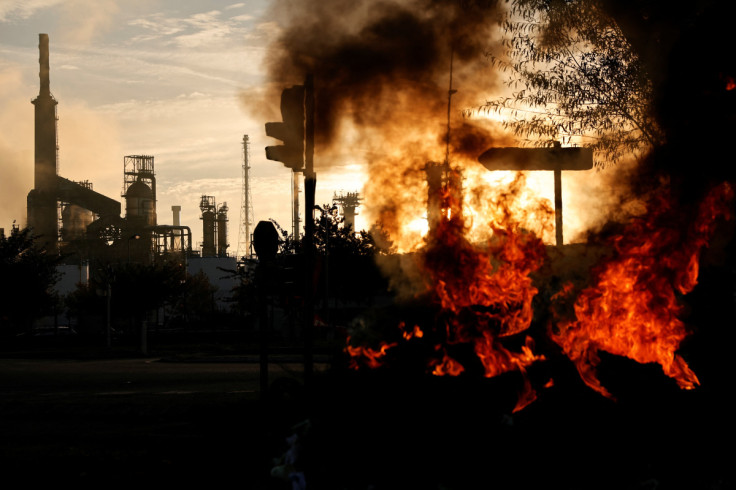 Fire burns in front of the ExxonMobil oil refinery in Port-Jerome-sur-Seine