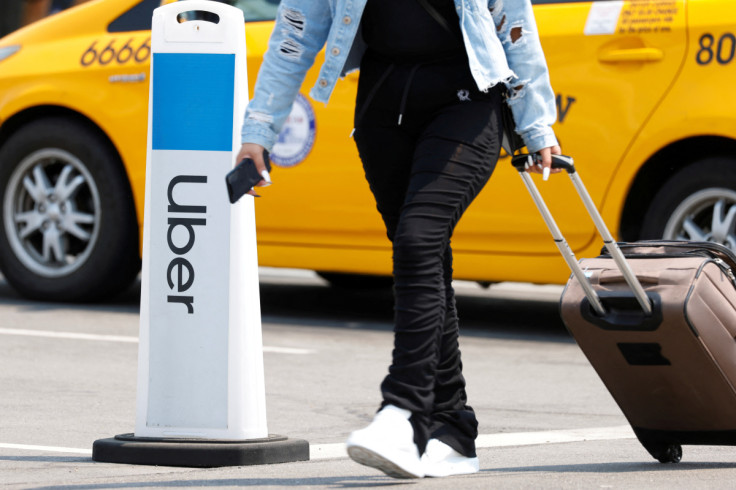 A traveler arriving at Los Angeles International Airport looks for ground transportation in Los Angeles