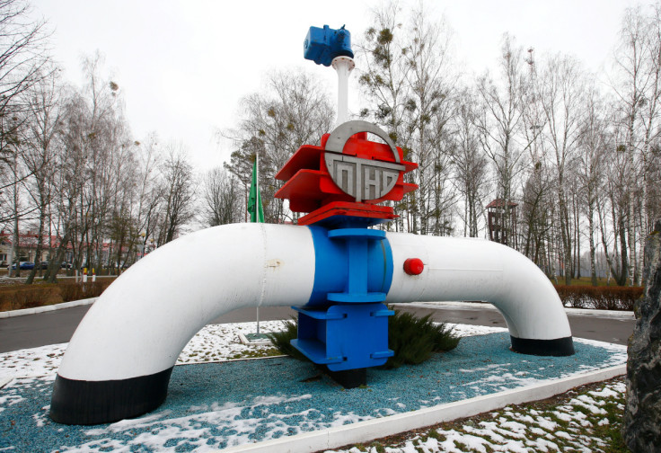 A model of a pipe line is seen at the main entrance to the Gomel Transneft oil pumping station