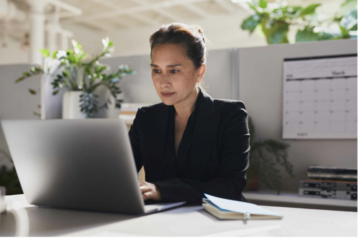 Woman Working on Laptop