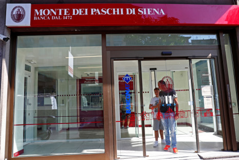 People are seen inside a Monte dei Paschi di Siena bank in Rome