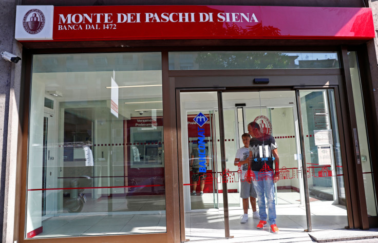 People are seen inside a Monte dei Paschi di Siena bank in Rome