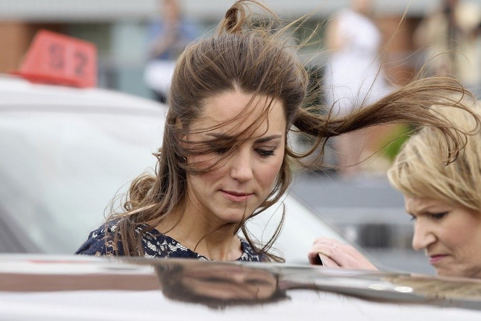 Kate Middleton embraces Canadas windy weather in style