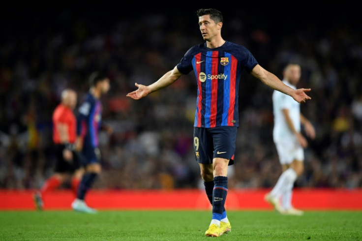 Robert Lewandowski scored twice but Barcelona are on the brink of a second straight group-stage exit