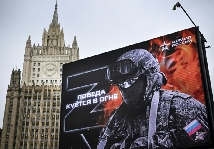 Russia's foreign ministry behind a billboard showing the letter 'Z' -- a tactical insignia of Russian troops in Ukraine -- with the caption 'Victory is forged in fire'