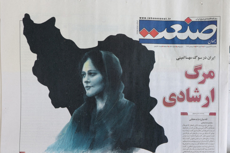 Newspapers with Amini, a victim of country's "morality police", are seen in Tehran