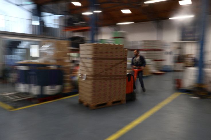 A man moves goods in Lisbon's biggest food bank