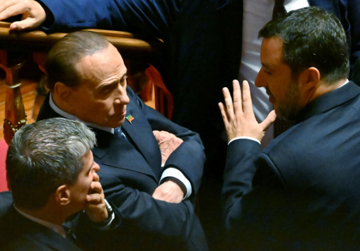 Former premier Silvio Berlusconi (seated) in discussion with the gesticulating Matteo Salvini, leader of the far-right League