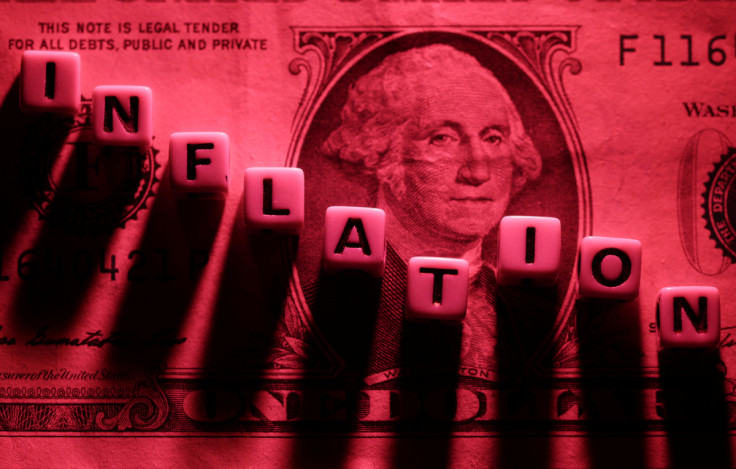Illustration shows plastic letters arranged to read "Inflation" are placed on U.S. Dollar banknote