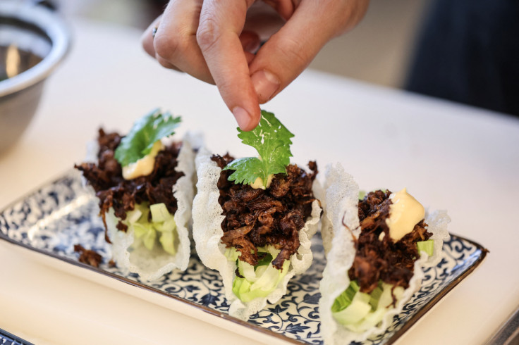 A chef garnishes a dish containing 3D printed plant-based vegan meat, produced by Israeli start-up Redefine Meat, in Rehovot, Israel