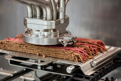 A large-scale "Angus" meat printer prints plant-based vegan meat at the offices of Israeli start-up Redefine Meat in Rehovot