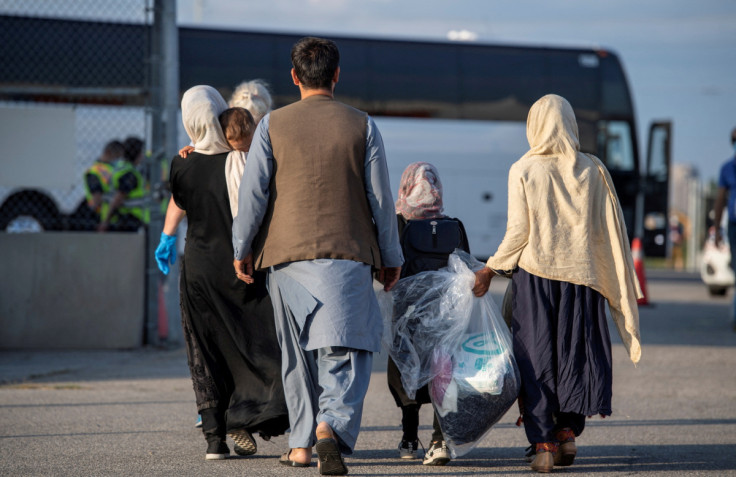 Afghan refugees who supported Canada's mission in Afghanistan arrive at Toronto Pearson International Airport in Canada