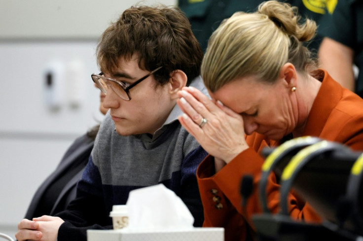 Nikolas Cruz (L) and his lawyer Melisa McNeill at his sentencing trial for the murders of 17 people at Marjory Stoneman Douglas High School in Parkland, Florida