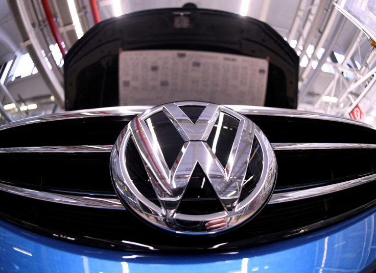 A Volkswagen logo is pictured in a production line at the Volkswagen plant in Wolfsburg