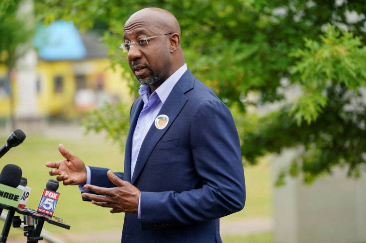 U.S. Senator Raphael Warnock casts early vote in Atlanta