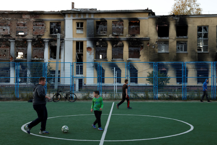 Playground in front of school destroyed by Russian military strike, in Kharkiv