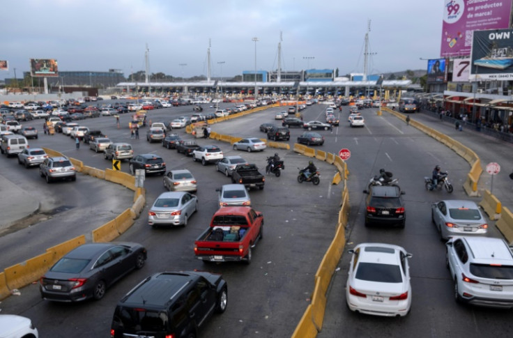 Cars queue to cross to the United States from Tijuana in northwestern Mexico