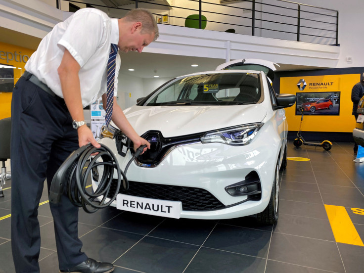 Steve Tomlin shows the new version of Renault's small battery electric Zoe model car in Reading, Britain