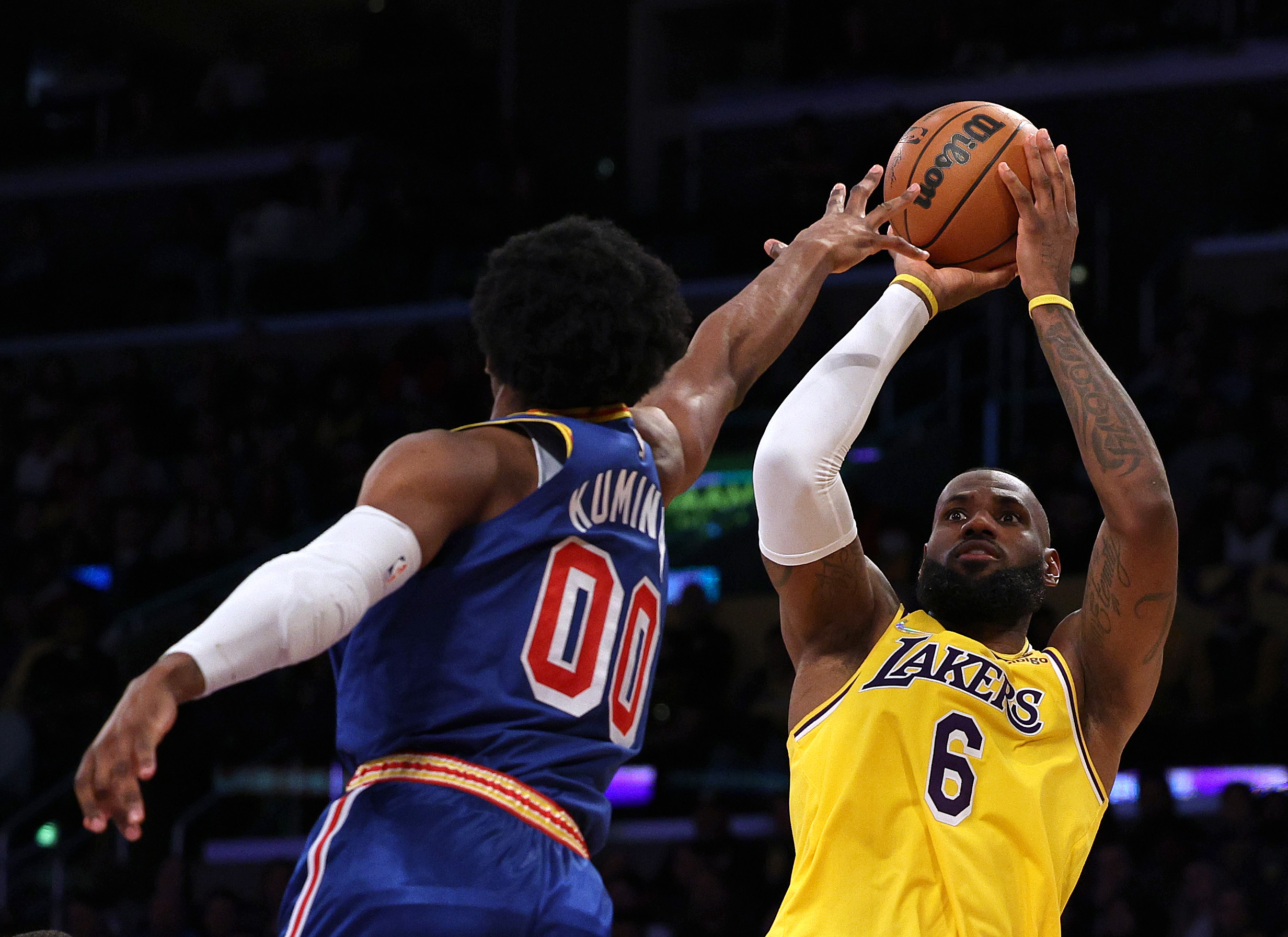 LeBron the brightest star among stars at Lakers home debut