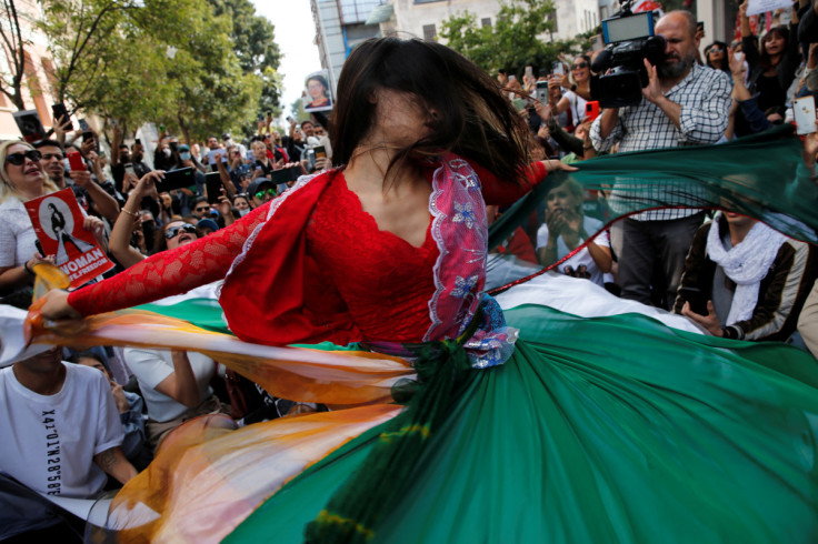 Mikaeil Alizadeh, also known by her stage name Leo, performs during a protest in Istanbul