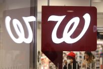People are seen shopping in a Walgreens, owned by the Walgreens Boots Alliance, Inc., in Manhattan, New York City