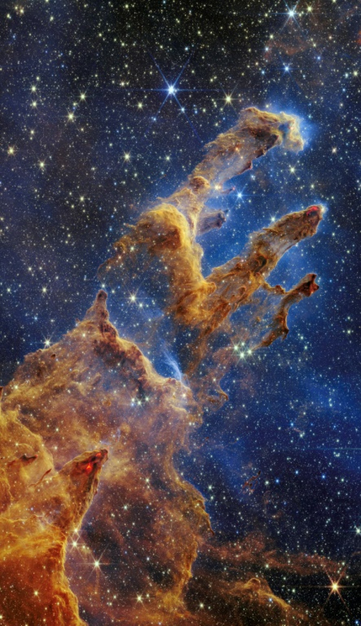 This handout photo provided by NASA on October 19, 2022 shows the 'Pillars of Creation' that are set off in a kaleidoscope of color in the James Webb Space Telescope's near-infrared-light view