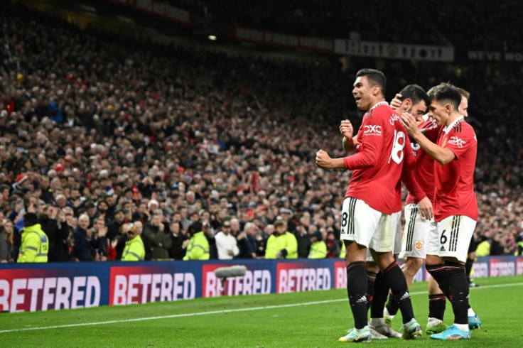 Manchester United beat Tottenham 2-0 to close within one point of the top four