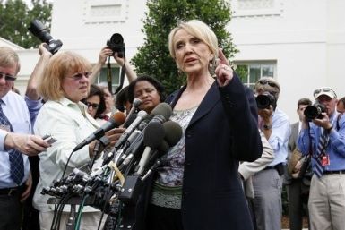 Arizona Republican Governor Jan Brewer signed into law on Thursday a controversial bill that bans most abortions after 20 weeks of pregnancy, giving Republicans a win in ongoing national efforts to impose greater restrictions on abortion.