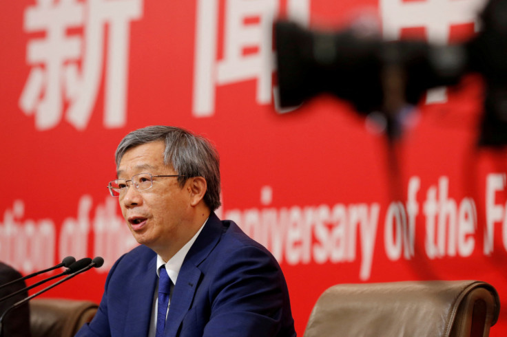 Governor of People's Bank of China (PBOC) Yi Gang attends a news conference on China's economic development ahead of the 70th anniversary of its founding, in Beijing