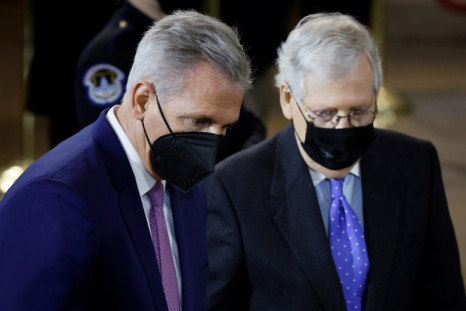 House Republican Leader Kevin McCarthy  (left) Senate Republican Leader Mitch McConnell, seen together in January 2022, have set different tones on assisting Ukraine